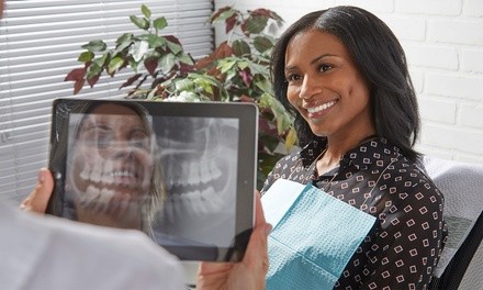 $26.40 for Dental Exam, X-Ray, & $1,500 Toward Implant or Fixed Bridge at Novel Smiles (Up to $1,800 Value)  