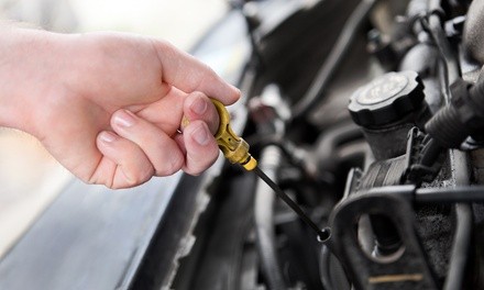 One or Three Oil Changes, Tire Rotations, and Inspections at Two Guys Automotive (Up to 72% Off)