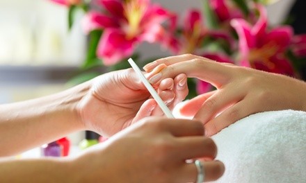 One or Two Regular Mani-Pedis or One Spa Mani-Pedi at Stacey's Permanent Solutions (Up to 46% Off)