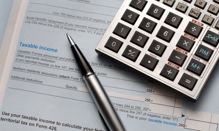 Tax Returns Preparation Services at Capital Tax Services (Up to 60% Off). Two Options Available.