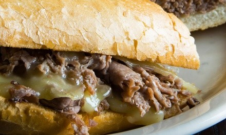 $12 for $20 Worth of Cheesesteak Sandwiches and Sides at Steak’m Take’m