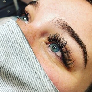 One Full Set of Classic or Hybrid Eyelash Extensions at Caitlyn at Rock Star Beauty Lounge (Up to 34% Off)