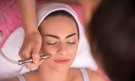 Pigment Facials with Microdermabrasion and Peel or Eyelid Skin Tightening at Tubac SkinSpa 
(Up to 61% Off)