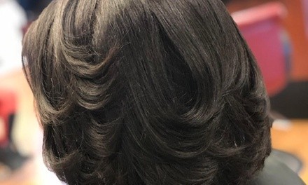 Classic or Exclusive Silk Press with Haircut and Conditioning Treatment at Stylin Beauty Chic (Up to 49% Off)