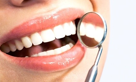 Exam, X-rays, and Cleaning or a Lumibrite Take-Home Whitening Kit at Crabtree Dental Center (Up to 88% Off)