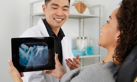 Dental Exam, X-Ray, Cleaning, Teeth Whitening, Retainer, More at United Dental Group (Up to 90% Off). 24 Options