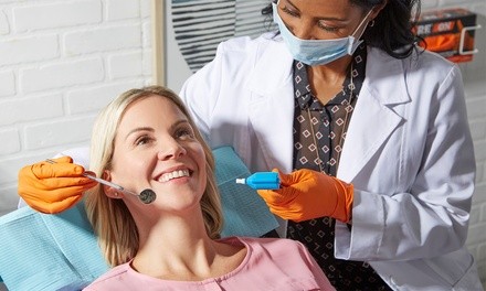 Dental Exam with X-Rays, Cleaning, and More at International Center for Advanced Dentistry (Up to 84% Off)