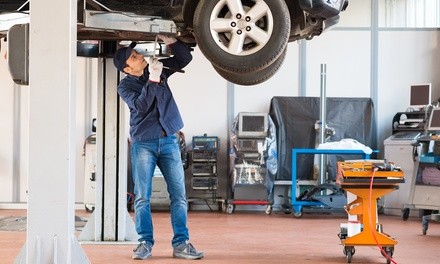 Synthetic or Semi-Synthetic Oil Change with Tire Rotation, Battery Check, at Dattolo Automotive (Up to 55% Off)