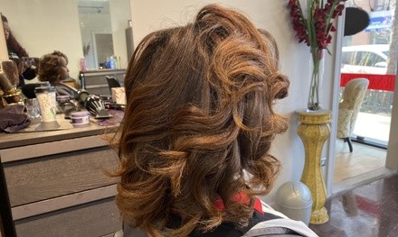 One or Two Shampoos, Silk Presses, and Trims at Hair Designs by Natasha “Tk” Lee (Up to 40% Off)