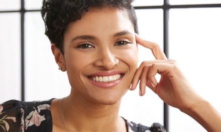 One or Two Implants with One Crown and Abutment at Wisconsin Smiles (Up to 69% Off)