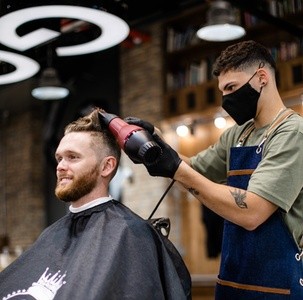 Up to 48% Off on Salon - Haircut - Men / Barber at Red Chair Studio, Inc.