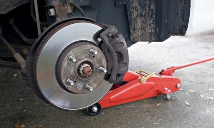 Four-Wheel Alignment or Brake-Pad Replacement at Midas (Up to 44% Off)