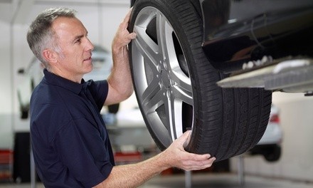 Front or Rear Brake Pad Replacement or Both with Tire Rotation at Automotive USA (Up to 65% Off)