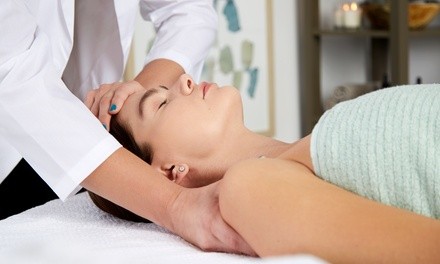 Exam, X-Rays, Adjustments, and HydroMassages at Regenerative Health Institute (Up to 87% Off)