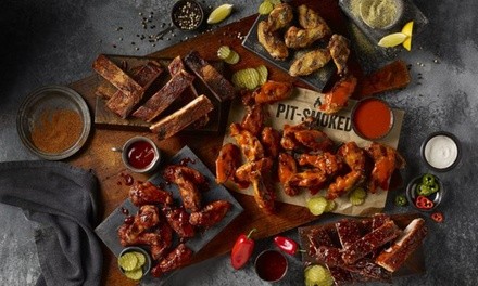 Wings Family Pack or XL Wings and Ribs Pack at Dickey's Barbecue Pit (Up to 16% Off)