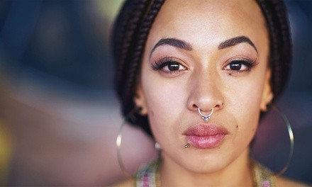 Nipple,Navel, Belly, Face, Ear, Nose, or Septum Piercing at Sinners Tattoo Studio (Up to 69% Off)
