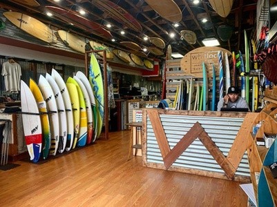 Wet Suit and Board Rental at Whitlock Surf Experience (Up to 50% Off). Six Options Available.