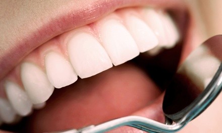 Tooth Extraction or Mini-Dental Implant at Express Denture Care Off (Up to 49% Off)