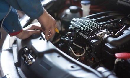 Conventional or Synthetic Oil Change at Broadway Tire and Auto Service - Two Locations Available (Up to 57% Off) 