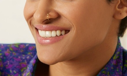 $169 for In-Office Zoom! Teeth-Whitening Treatment with Sonicare Toothbrush at Manus Dental ($549 Value)