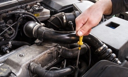 Semi- or Full-Synthetic Oil Change with Tire Rotation Up to 5 Quarts at AB Smog and Auto Repair (Up to 56% Off)