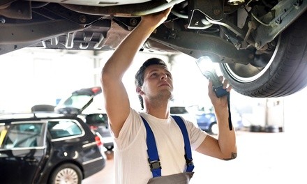 Four-Wheel Alignment and Tire Rotation at Elite Tire Automotive Center (Up to 42% Off). Two Options Available.