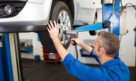 Front or Rear Brake Pad Replacement or Both with Add-Ons at National Tire & Auto Repair (Up to 60% Off)