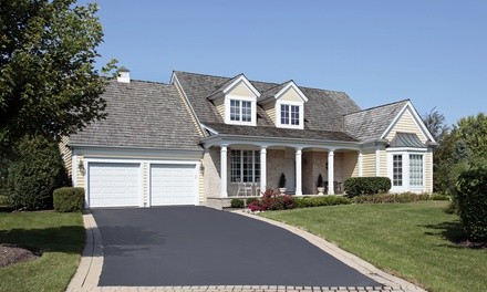 Sealcoating and Optional Edging Driveway from Asphalt Unlimited (Up to 57% Off). Three Options Available.