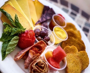 Up to 42% Off on American Cuisine at The 805 Bar