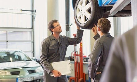 Four-Wheel Alignment or Brake-Pad Replacement at Midas (Up to 52% Off)