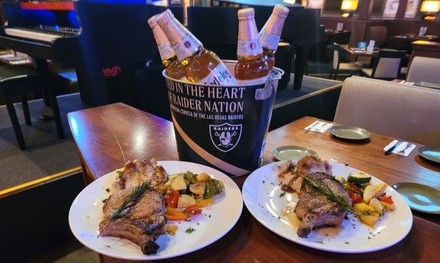 $49.99 for Bone-In Chop Dinner for Two with Wine or Beer at Michael T's Steaks, Ribs, & Burgers ($98.96 Value)
