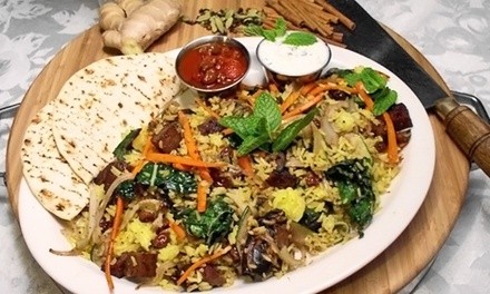 Vegetarian Cuisine and Drinks at Dharma's Restaurant (42% Off). Two Options Available. 