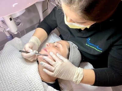 $119.20 for Dermaplaning with One-Layer Chemical Peel at Begin Anew Med Spa ($250 Value)