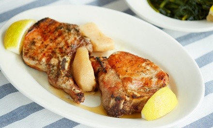 $18 for D'usse Smothered Porkchops with Two Sides at Chicken Heaven, Takeout and Dine-In ($24 Value)