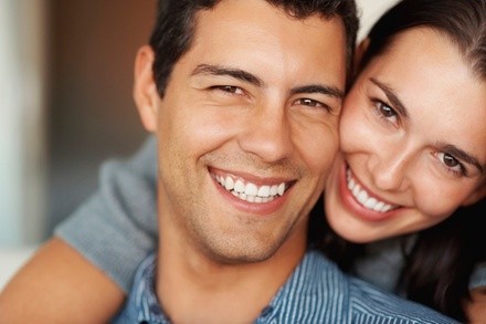 One or Two 60-Minute Teeth-Whitening Sessions or One 90-Minute Sessions at Smiles & Styles (Up to 30% Off)