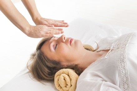 Up to 50% Off on Reiki at Glow Holistic Skincare and Wellness