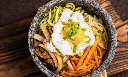 Korean Cuisine at Stone Age Korean Grill Bar (Up to 28% Off). Three Options Available.