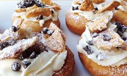 $14.50 for Two Vouchers, Each Good for One Dozen Donuts at Adrienne & Co Donuts and Desserts ($26 Value) 