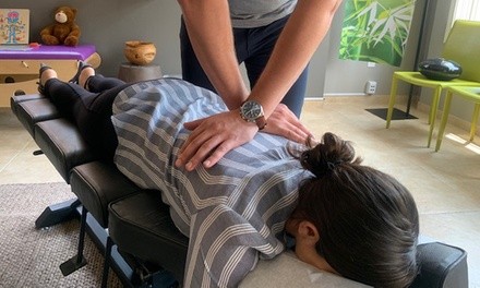 Chiropractic Package with Massage, One or Three Adjustments, and X-Rays at 100% Chiropractic (Up to 82% Off)